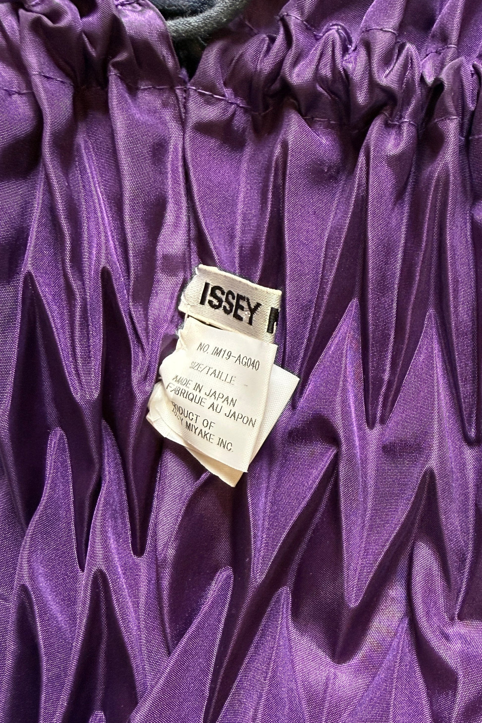 Issey Miyake dark purple black string hand bag, 2011