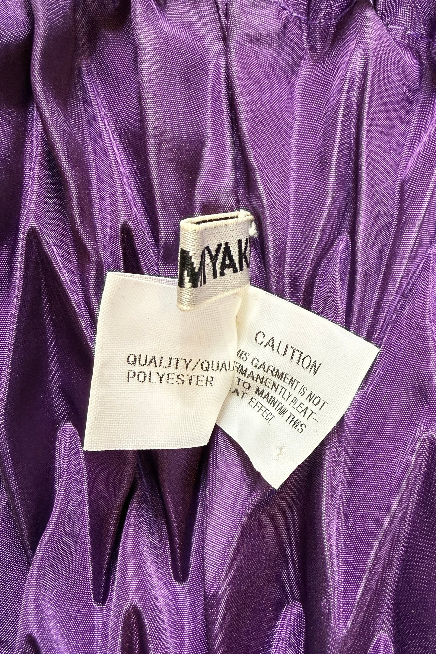 Issey Miyake dark purple black string hand bag, 2011