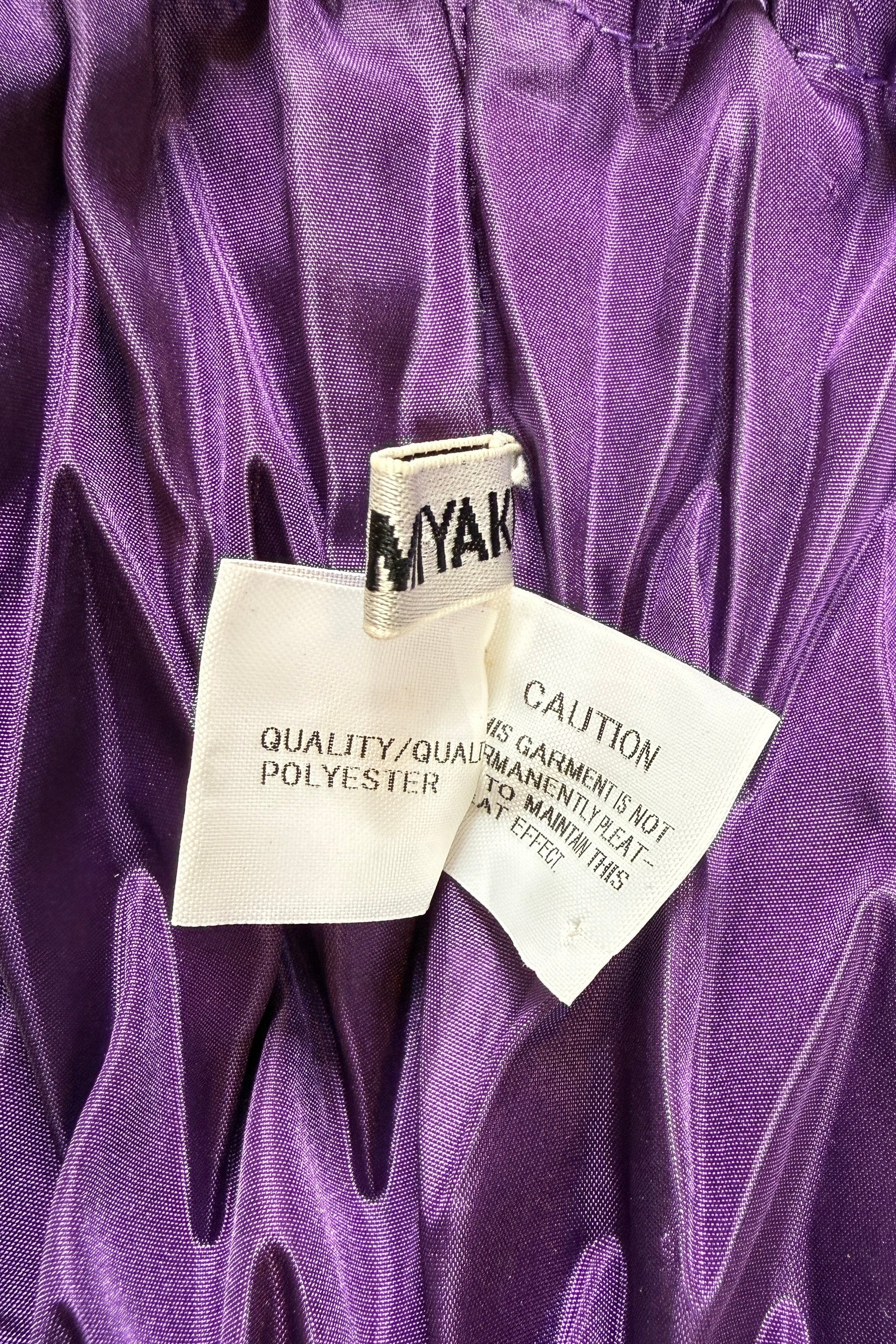 Issey Miyake dark purple black string hand bag, 2011