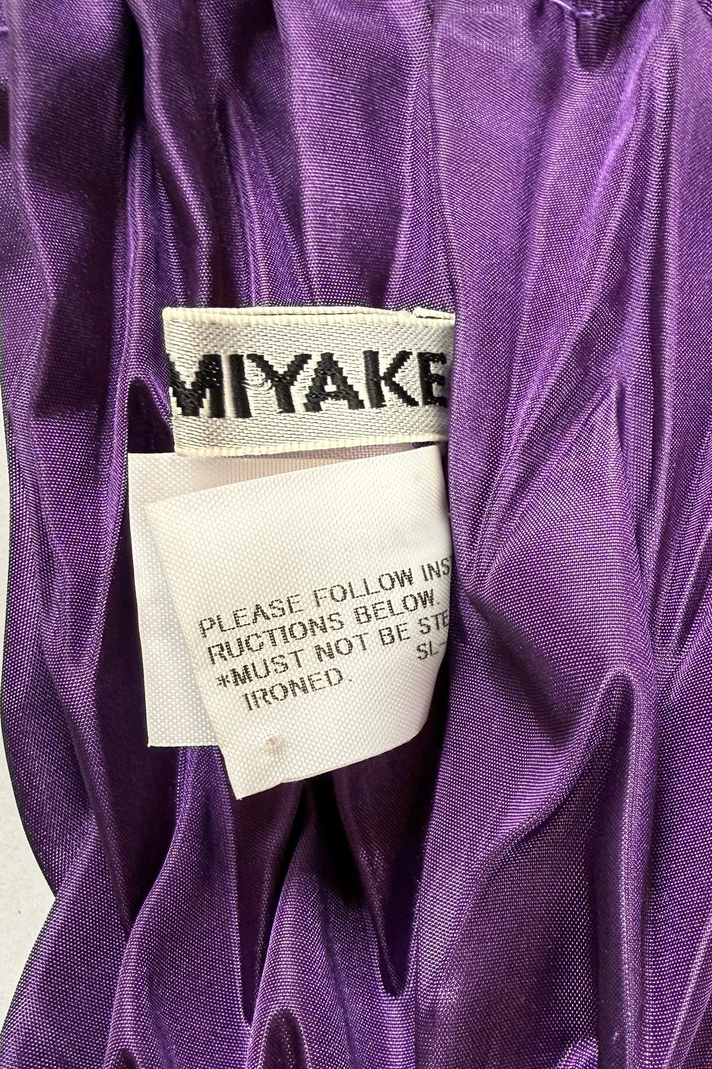 Issey Miyake dark purple black string hand bag, 2011
